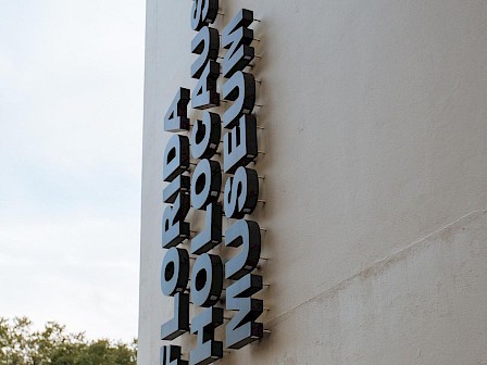 The image shows a sign that reads